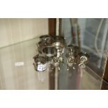 A SILVER NAPKIN RINGS, BIRMINGHAM AND A SET OF SIX ELECTROPLATE NAPKIN RINGS, ANOTHER AND A PAIR