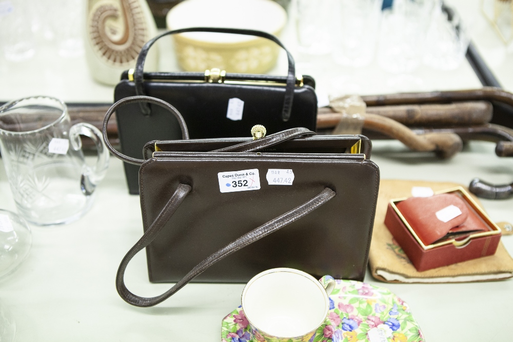 TWO LADY'S HAND BAGS, LEATHER HANDKERCHIEF CASE, CYMA AMIC SWISS MADE TRAVEL CLOCK IN LEATHER CASE