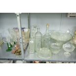 A COLLECTION OF CUT GLASS AND GLASSWARE'S, VARIOUS DECANTERS, A PUNCH BOWL AND GASSES, BON BON