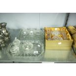 A BOXED CUT GLASS SET INCLUDING; VASES, TRINKET BOX AND COVER AND TWO DRESSING TABLE SETS