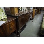 VICTORIAN MAHOGANY SERPENTINE SIDEBOARD, TWO CUPBOARDS TO EITHER END WITH TWO CENTRAL GRADUATED