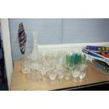 A QUANTITY OF CUT AND MOULDED STEM WINE GLASSES TO INCLUDE; CHAMPAGNE, SHERRY AND COLOURED TALL