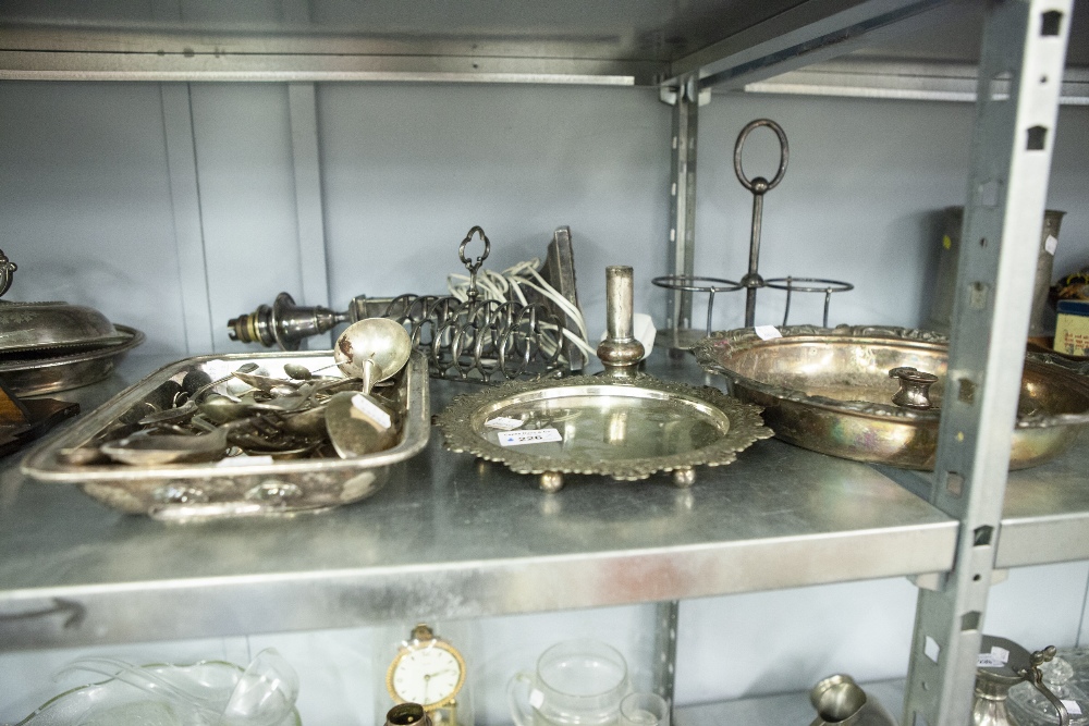 AN ELECTROPLATED CANDLESTICK CONVERTED TO AN ELECTRIC TABLE LAMP, A PLATED TOAST RACK AND A SMALL