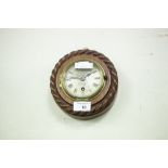 A WOODEN CASED SMALL WALL CLOCK, WITH ROPE DECORATION, 8 DAY FRENCH PLATFORM ESCAPEMENT, SILVERED