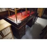 A REPRODUCTION MAHOGANY TWIN PEDESTAL DESK