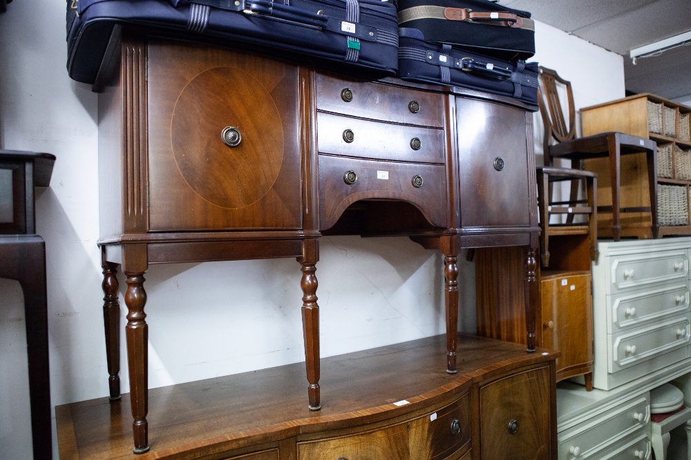 A REPRODUCTION MAHOGANY SIDEBOARD, THREE CENTRAL DRAWERS AND CUPBOARD TO EITHER SIDE