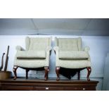 A PAIR OF TWENTIETH CENTURY LOUNGE CHAIRS, IN CREAM FABRIC