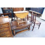 A REPRODUCTION OAK DROP LEAF COFFEE TABLE AND A SMALLER EXAMPLE WITH SWIVEL TOP (2)
