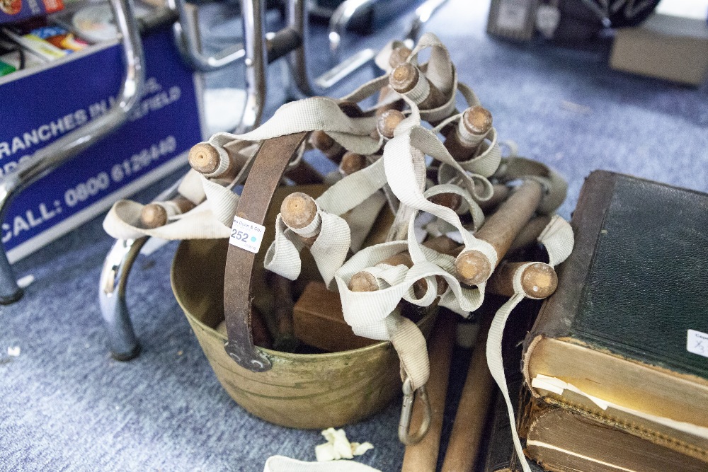 A BRASS JAM PAN AND A CORD 'ROPE' LADDER WITH WOODEN RUNS