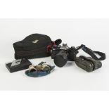 OLYMPUS OM-2 SPOT/PROGRAM SLR ROLL FILM CAMERA, with 35-70mm, f3.5-4.5 auto zoom lens, in soft case,