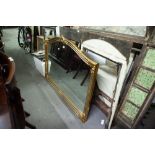 A MODERN OVER MANTEL MIRROR, WITH GILT PANEL HIGHLIGHTS