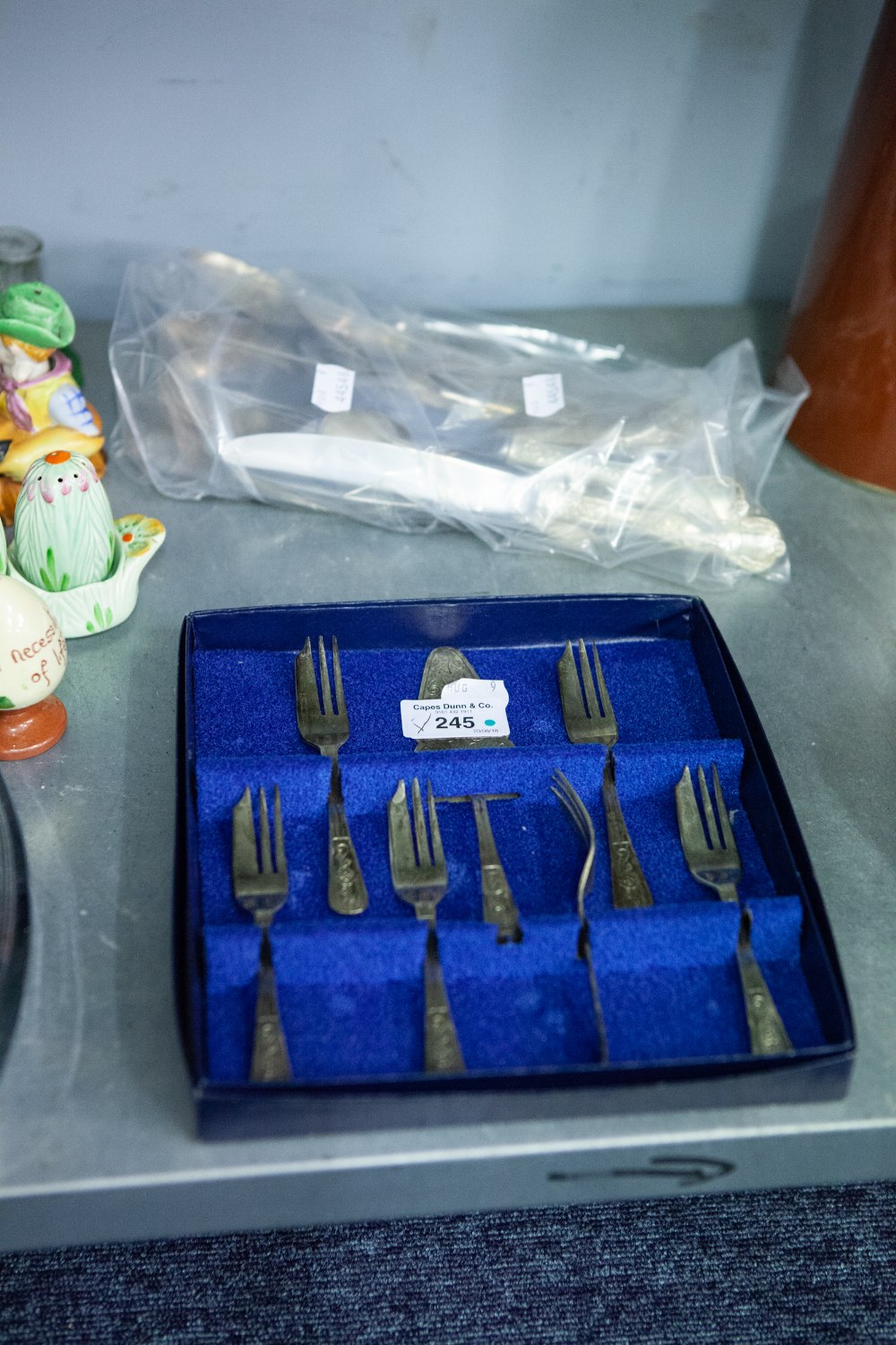 A SET OF SHEFFIELD SILVER PLATE CAKE FORKS AND A SERVER, FOR SIX PERSONS, AND A COLLECTION OF SILVER