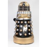 GOLD, SILVER AND BLACK PAINTED MANUFACTURED BOARD AND FIBREGLASS MODEL OF A DALEK, with internal