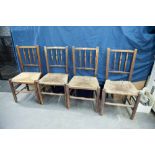 A SET OF FOUR NINETEENTH CENTURY ELM RUSH SEATED SINGLE CHAIRS