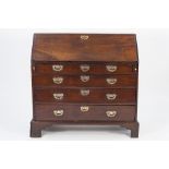 GEORGE III MAHOGANY BUREAU, of typical form with four long, graduated drawers, fitted with brass