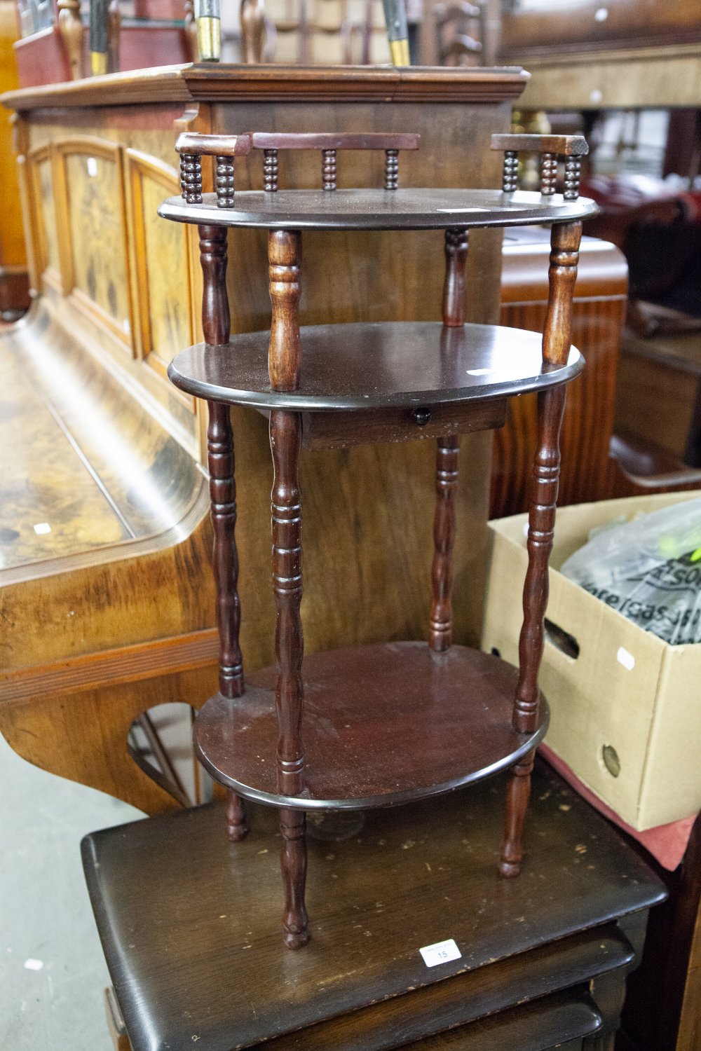 A SMALL MODERN MAHOGANY OVAL THREE TIER WHAT-NOT AND A 1960's KIDNEY SHAPED COFFEE TABLE ON TV LEGS