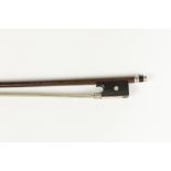 A LATE NINETEENTH CENTURY VIOLIN BOW, with silver tip
