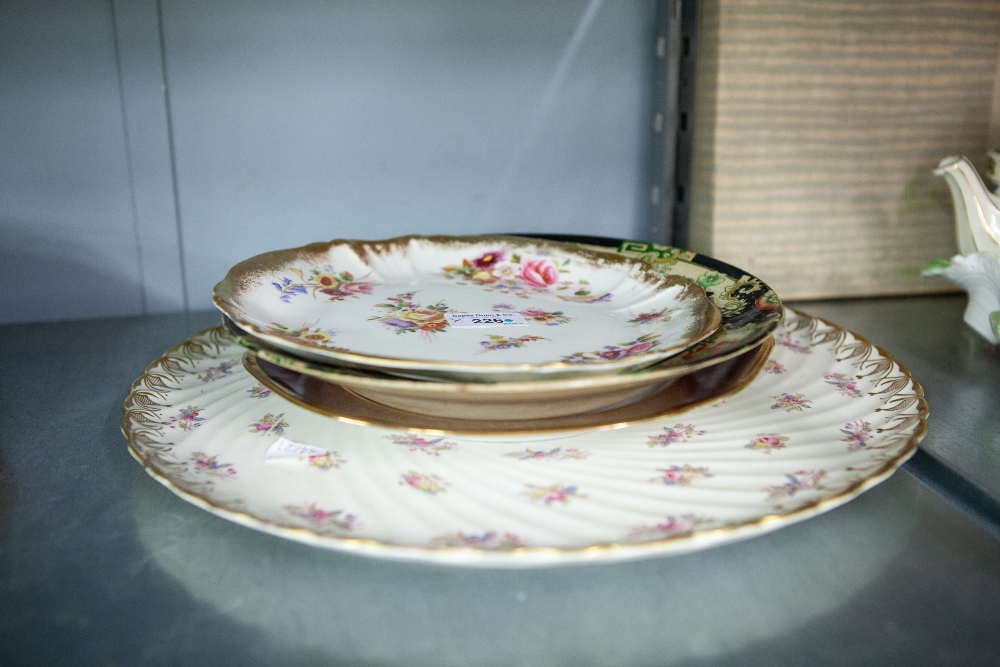 LARGE ROUND SERVING CERAMIC PLATE, DECORATED WITH FLOWERS, LIMOGES PLATE AND TWO OTHERS (4)