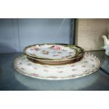 LARGE ROUND SERVING CERAMIC PLATE, DECORATED WITH FLOWERS, LIMOGES PLATE AND TWO OTHERS (4)