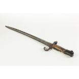 NINETEENTH CENTURY SWORD BAYONET, with slightly curved single edged blade, scrolled guard, wooden