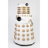 WHITE AND GOLD PAINTED FIBREGLASS MODEL OF A DALEK, with plastic, white metal and mesh detail and