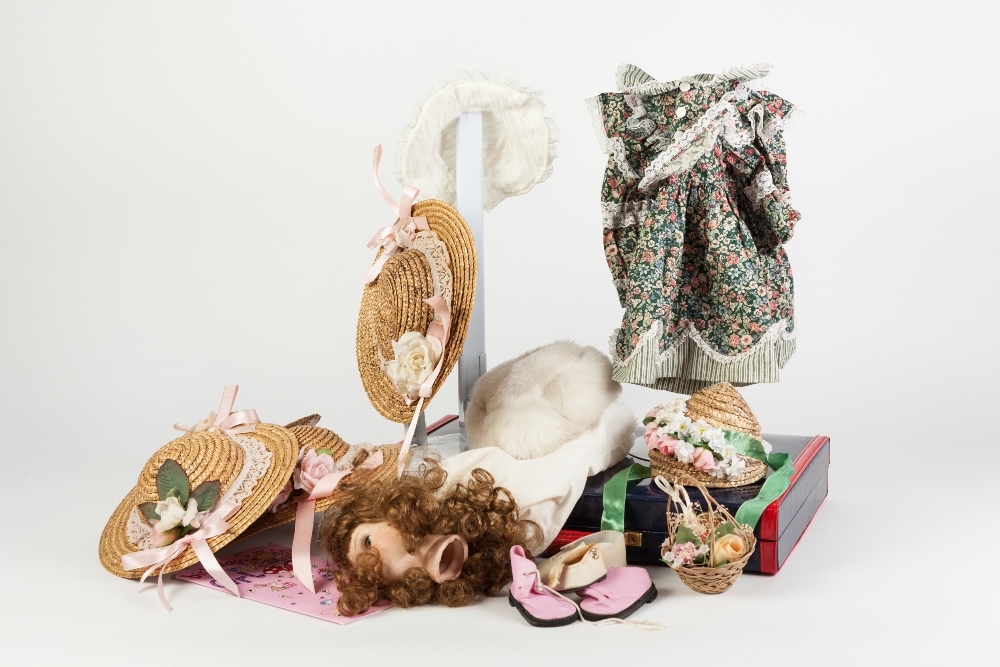 QUANTITY OF DOLLS SHOES AND HATS AND TWO METAL STANDS, TOGETHER WITH A BACKGAMMON SET, in case