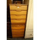 PAIR OF TEAK FINISH FOUR DRAWER BEDSIDE CHESTS OF DRAWERS, 1'8" WIDE