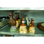 BESWICK MATTHEW GLOAG 'THE FAMOUS GROUSE' LIQUOR' BOTTLE AND EIGHT OTHER BELL'S WHISKY CERAMIC