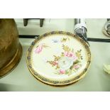 A SET OF EARLY TWENTIETH CENTURY PAINTED PLATES WITH YELLOW GROUND AND HAND PAINTED FLOWERS