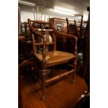 A NINETEENTH CENTURY POSSIBLY FRUITWOOD RUSH SEAT ARMCHAIR