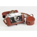 ZORKI-4, RUSSIAN ROLL FILM CAMERA, No: 68657153, in brown leather case with cased LENS HOOD to the