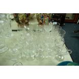 A COLLECTION OF CUT GLASS DRINKING GLASSES, APPROX 31