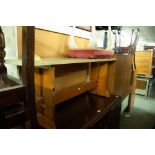 A FORMICA TOPPED BENCH SEAT ON PINE TRESTLE SUPPORTS AND A WHITE FINISHED DRESSING STOOL, BUTTON