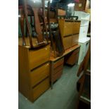 A TEAK FINISH THRE DRAWER FILING CABINET AND TWO TWO-DRAWER DITTO (3)