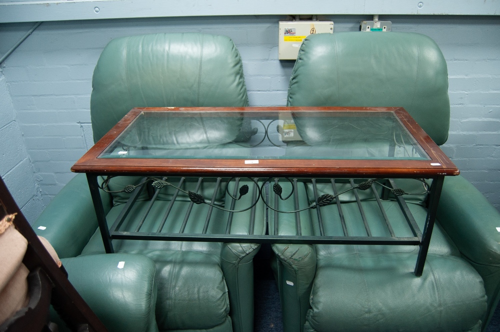 A METAL FRAMED COFFEE TABLE WITH INSET GLASS TOP