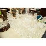 A COLLECTION OF CUT GLASS AND CRYSTAL GLASSES, VASES, DECANTERS, GRAPEFRUIT BOWLS ETC.....