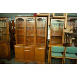 A MODERN TEAK FINISH DISPLAY CABINET WITH THREE GLASS DOORS, ALSO A MATCHING HI-FI CABINET (2)