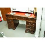 A REPRODUCTION MAHOGANY TWIN PEDESTAL DESK