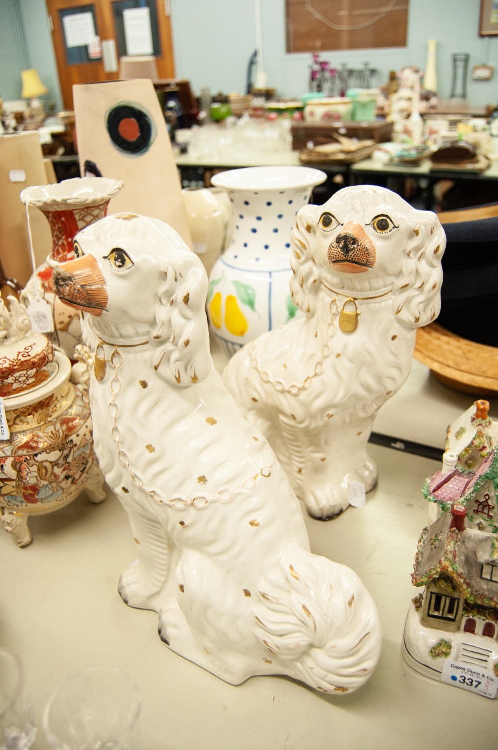 PAIR OF STAFFORDSHIRE POTTERY LARGE MODELS OF MANTLE DOGS, each of typical form with gilt splashed