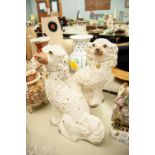 PAIR OF STAFFORDSHIRE POTTERY LARGE MODELS OF MANTLE DOGS, each of typical form with gilt splashed