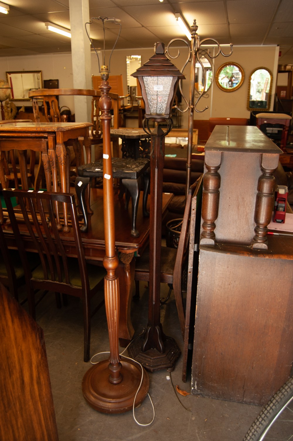 AN OAK STANDARD LAMP WITH LANTERN PATTERN TOP AND ANOTHER STANDARD LAMP