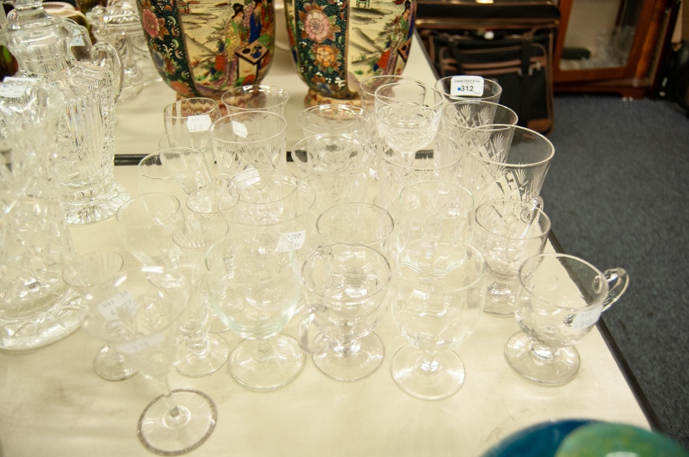 A COLLECTION OF CUT GLASS DRINKING GLASSES, APPROX 31