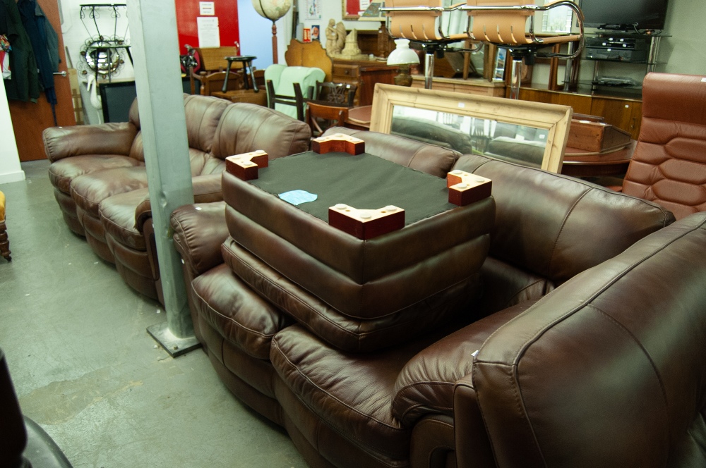 A DARK BROWN HIDE LOUNGE SUITE OF FOUR PIECES, VIZ A THREE SEATER SETTEE, A TWO SEATER SETTEE, A - Image 2 of 2