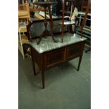 A MAHOGANY INLAID DRESSING TABLE WITH OBLONG SWING MIRROR, A MATCHING TWO DOOR WASHSTAND WITH MARBLE