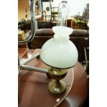 BRASS AND WHITE GLASS OIL TABLE LAMP, of typical form with domed shade and clear glass chimney,