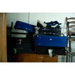 SEVEN VARIOUS SUITCASES AND A HOLD-ALL