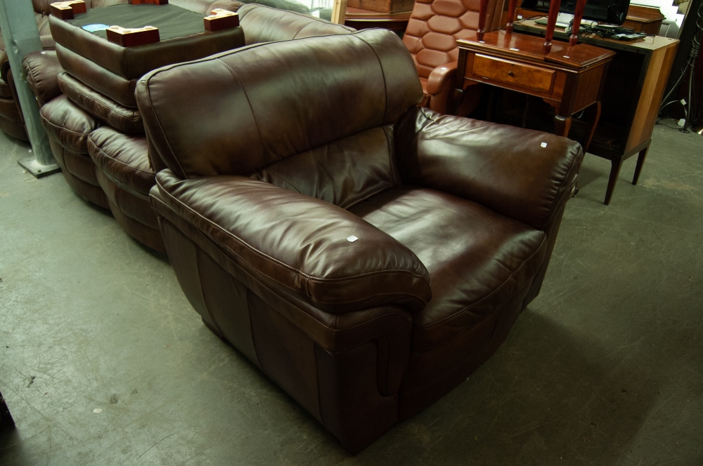 A DARK BROWN HIDE LOUNGE SUITE OF FOUR PIECES, VIZ A THREE SEATER SETTEE, A TWO SEATER SETTEE, A