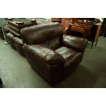 A DARK BROWN HIDE LOUNGE SUITE OF FOUR PIECES, VIZ A THREE SEATER SETTEE, A TWO SEATER SETTEE, A