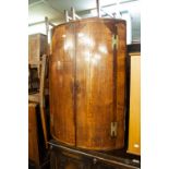 VICTORIAN OAK BOW FRONTED CORNER CUPBOARD WITH SOLID DOORS (LACKING CORNICE)