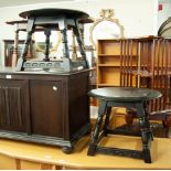 A PAIR OF PRIORY DARK OAK CIRCULAR LOW TABLES/STOOLS (2)